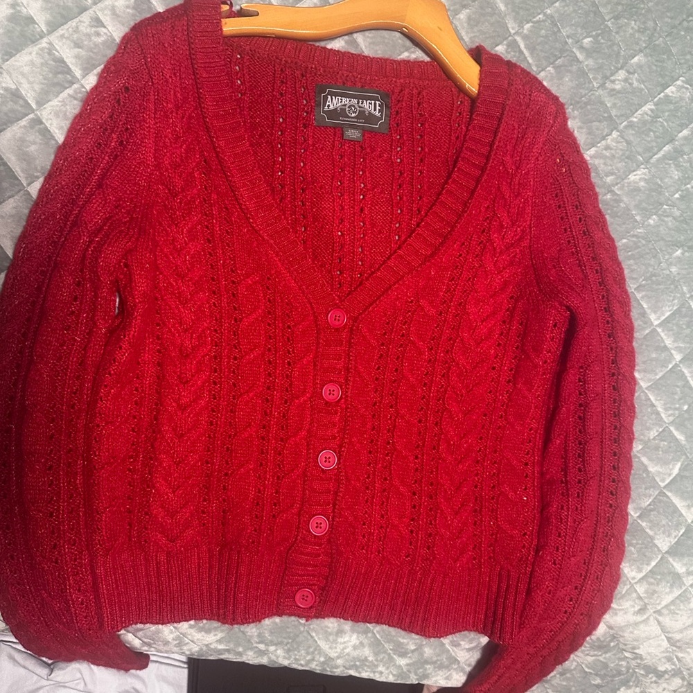 American Eagle red sweater.